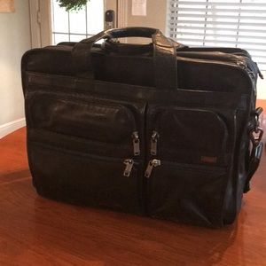 TUMI expandable leather laptop briefcase.